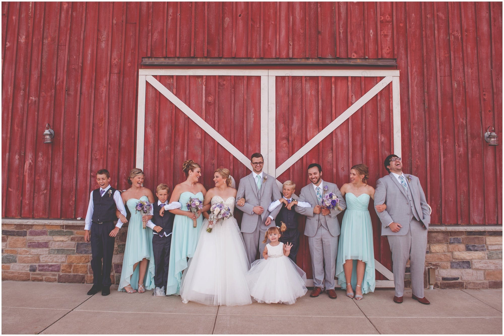 County Line Orchard Wedding Photographer wedding party in front of the red bard
