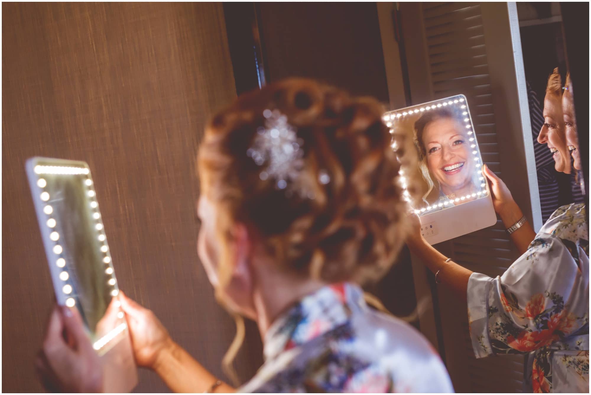 Eaglewood Resort Wedding Photographer bride getting ready interesting reflection with mirror